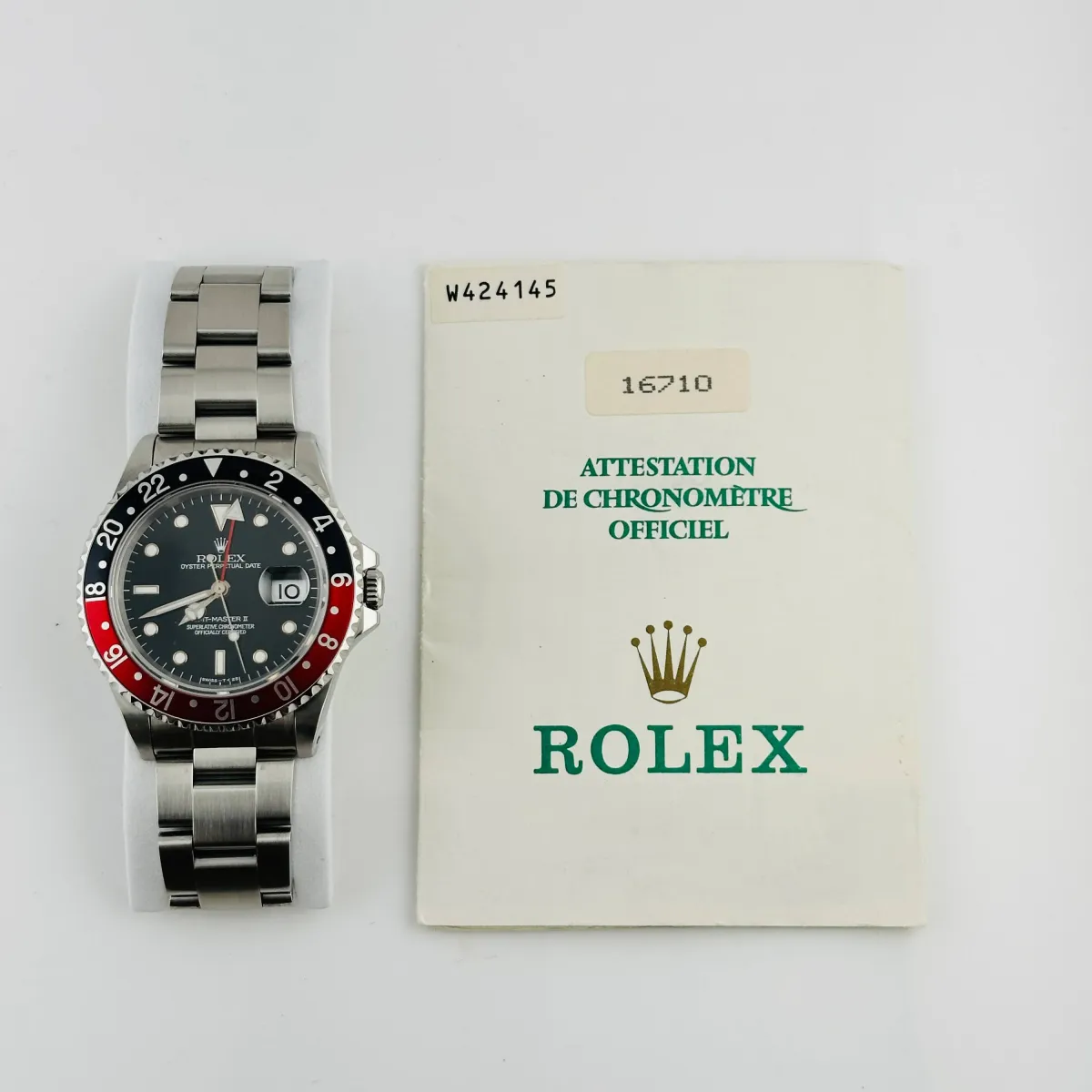 Rolex GMT-Master II Coke Black Dial on Oyster Ref 16710 with Papers 1996