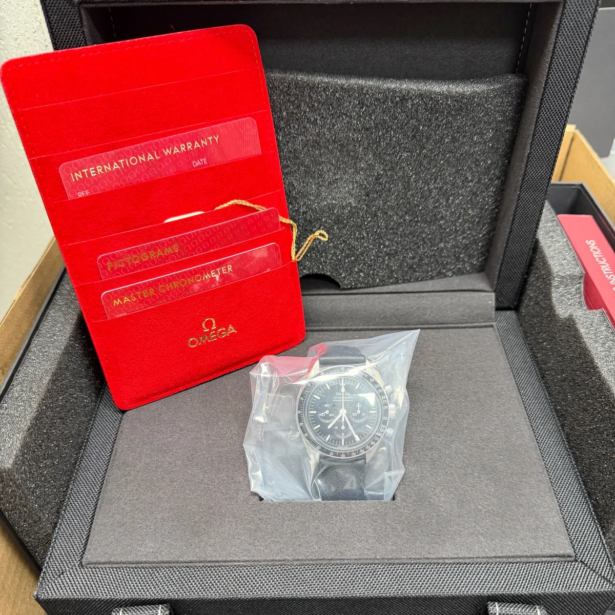 Omega Speedmaster Moonwatch Professional Co-Axial Master Chronometer Chronograph Black Dial on Leather Strap Ref 310.32.42.50.01.002 with Card