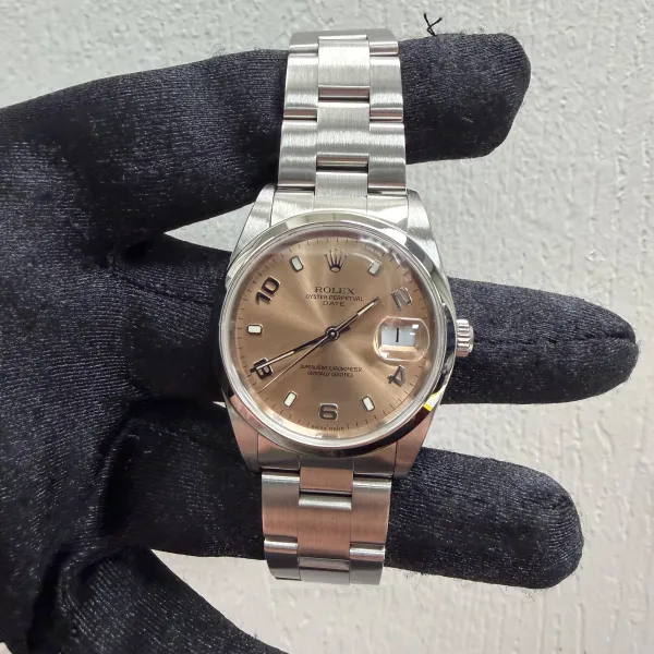 Rolex Oyster Perpetual Date Pink Dial