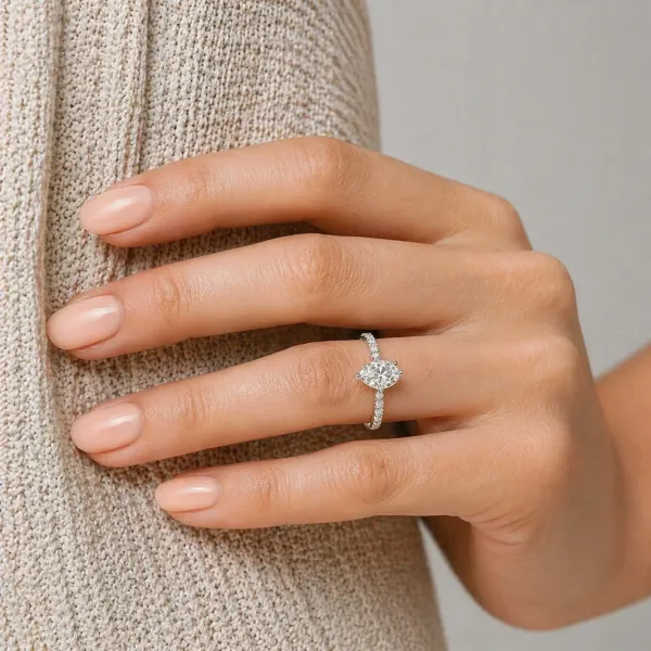 Pear Shaped Center Diamond And Round Lab Grown Diamond Ring